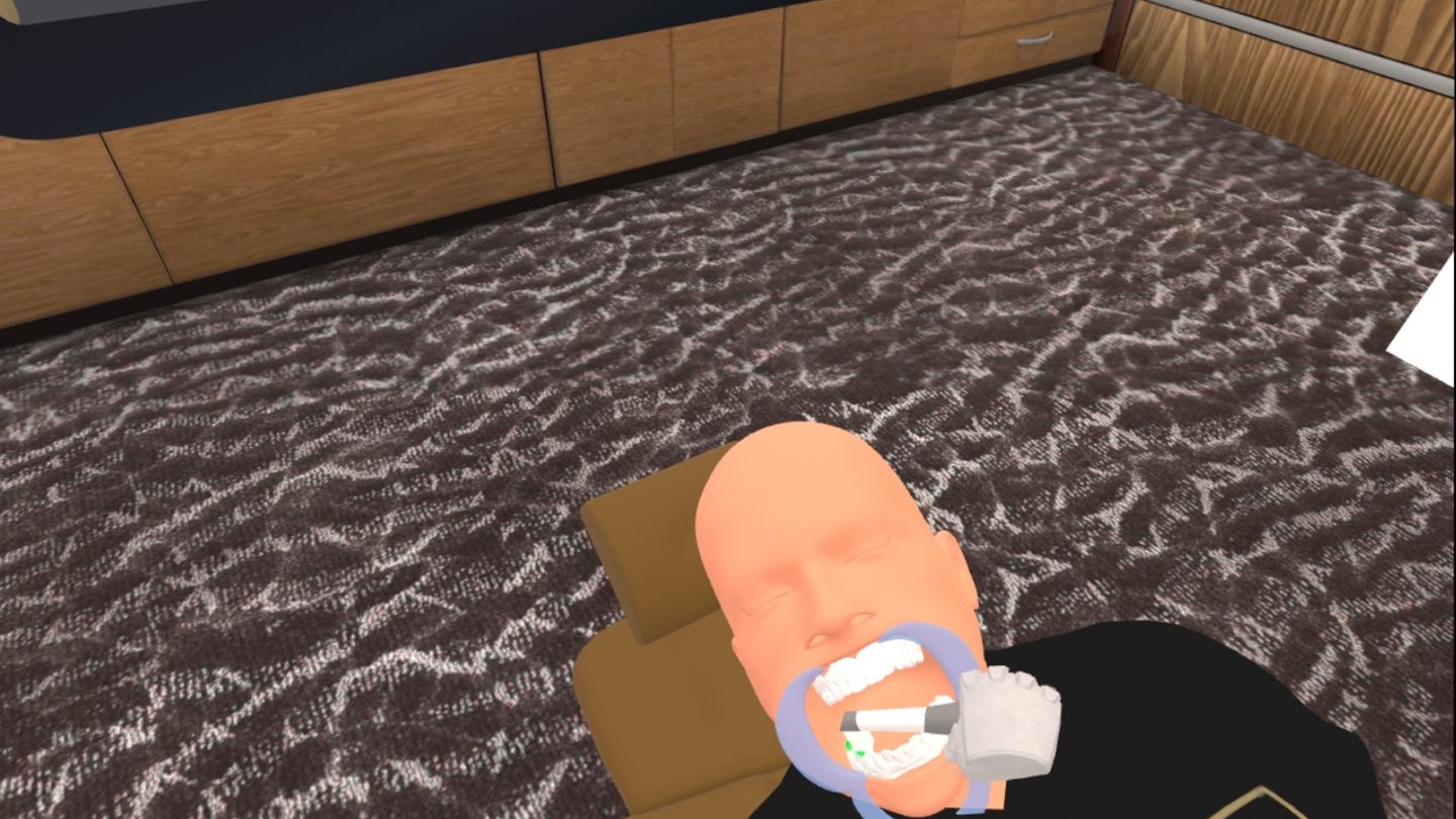Kois Center VR - Group collaboration view showing multiple users learning together in virtual dental training environment