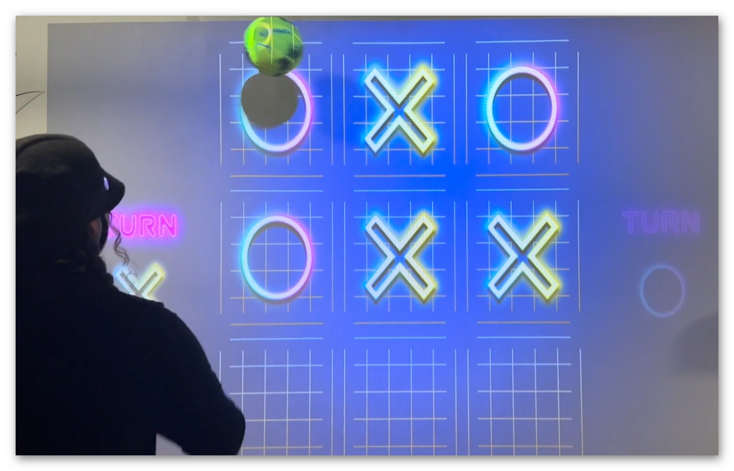 Educational environment with students using interactive wall game for learning